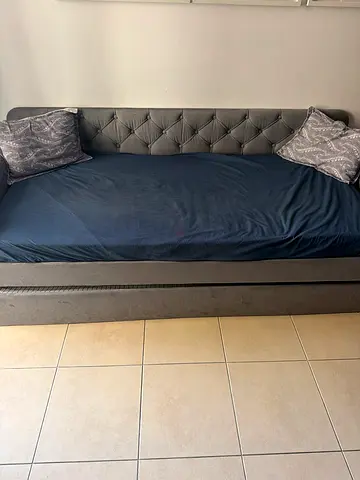 Queen upholstered bed frame with tufted headboard - good condition negotiable Includes ONE MATTRESS