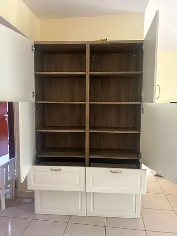 Large freestanding storage cabinet with shelves and drawers - good condition