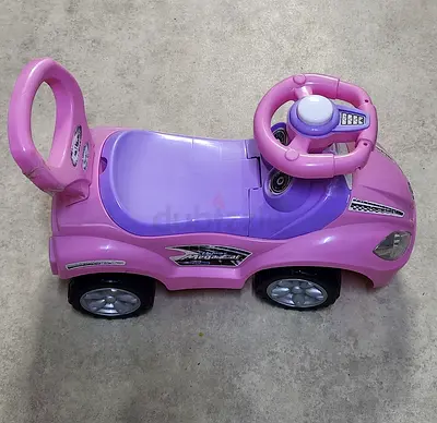 Kids ride-on push car with steering wheel — good used condition
