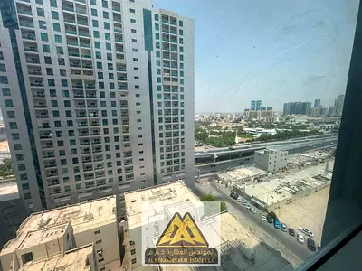 Rental – 1-Bedroom Apartment with Open View in Al Nuaimiya 3 A 1-bedroom apartment with a living room is available for annual rent in Al Madina Tower,