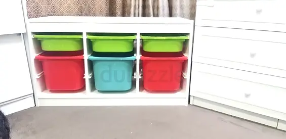 IKEA White children's storage unit with 6 colorful pull-out bins