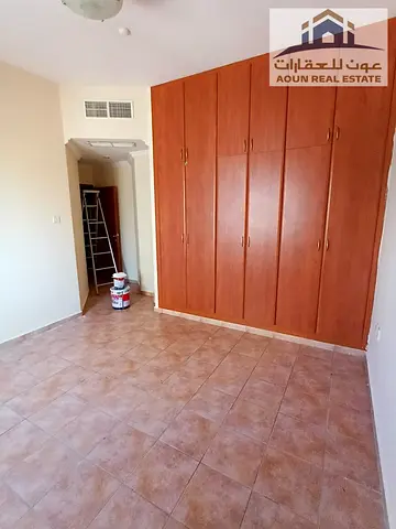 Apartment in Al Majaz 3 Facing Safia Park 3 bedrooms and a large living room 3 bathrooms and a Rent 50,000 in 6 installment