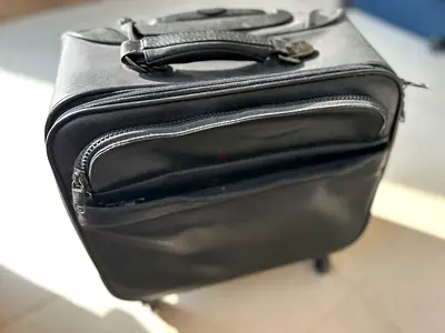 ELLE Small black roll-on cabin bag, good condition