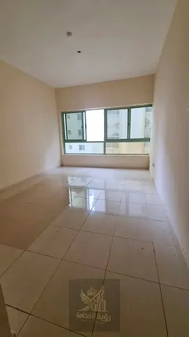 1 Bedroom + Living Room, 1 Bath, Split AC, Al Shuwaiheen, directly by the Corniche. AED 22K/year, 6 cheques, AED 1,500 deposit.
