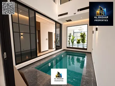 فيلا تصميم عصري مسبح وسط بهو عالي السعر شامل رسوم التسجيل و التملك و أجهزة المكيفات.