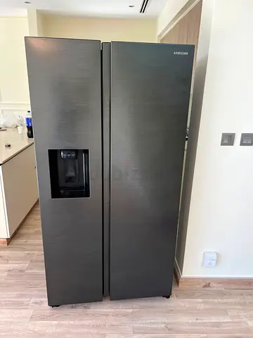 Samsung side by side fridge and freezer new model slightly used with ice maker water dispenser