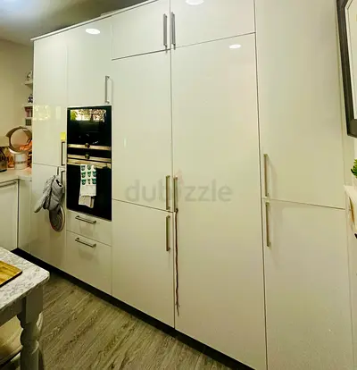 IKEA PAX tall white glossy kitchen storage cabinets (built-in look)