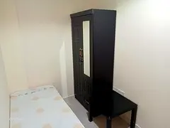 LOCATED BACKSIDE AL BUSTAN CENTER, FULLY FURNISHED PARTITION ROOM FOR 1 BACHELOR(MAN)