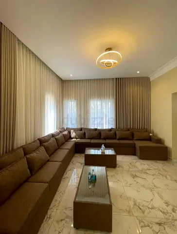 Large L-shaped Brown Fabric Sofa Set with Matching Coffee Tables