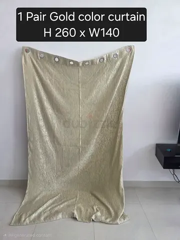 Pair of gold curtain panels with eyelet tops — H260 x W140 cm
