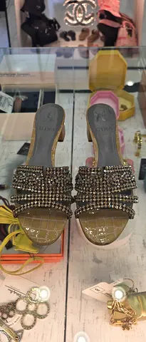 Used women's crystal-embellished slip-on sandals, size not marked