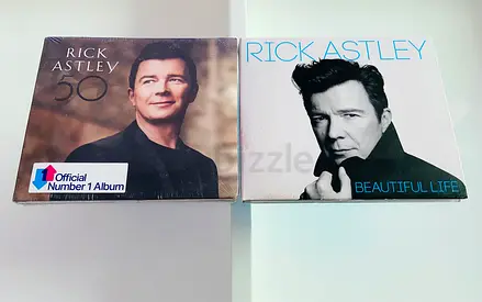 2 Rick Astley Music CD’s