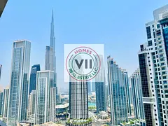 High-Floor 2BR Apartment | Burj Khalifa View | Balcony