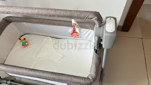 Only one time Used bedside bassinet / cradle with mattress and vibration unit