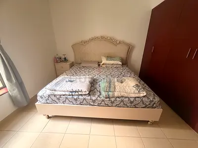 King size bed with carved headboard - good condition
