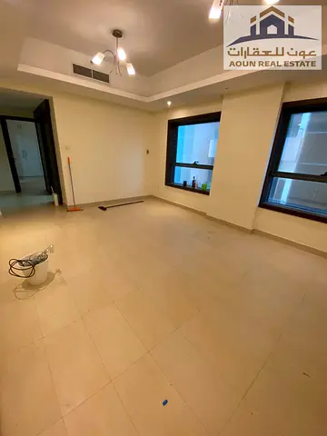 One-bedroom apartment with a living room in Al Khan; first-time occupancy. Security deposit: 2,000. Payment plan 4 installments. Includes free parking
