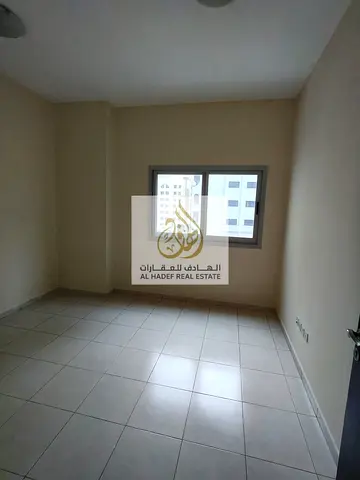 For annual rent in Al Qasimia, Al Nud: two bedrooms, a living room, two bathrooms, spacious, fully open view, free maintenance. Payments in 6 or 4 ins