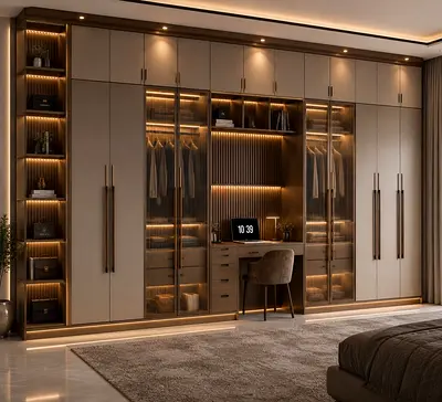 Built-in walk-in style wardrobe with integrated lighting and desk