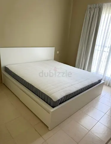 Ikea king size bed with mattress and storage drawers