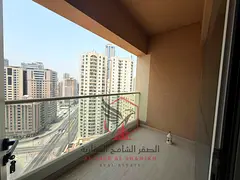 Spacious 2-bedroom apartment with a living room in Al Majaz 3, featuring clean finishing and an open