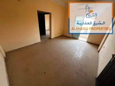 A great opportunity in Al Rashidiya – Two bedrooms and a living room with a balcony and open view a