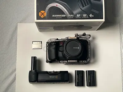 Blackmagic Pocket Cinema Camera 6K with title Cage, battery Grip and tow Extra Batteries 256G card