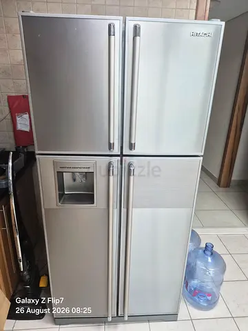 Hitachi Stainless Steel Side-by-Side Refrigerator with Water Dispenser - Good Condition