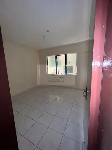 Spacious 2-Bedroom Apartment in Al Majaz 1 with Large Distributor, Separate Living Room, 4-Payment Plan and Clear Sharing Contract in a Prime Location
