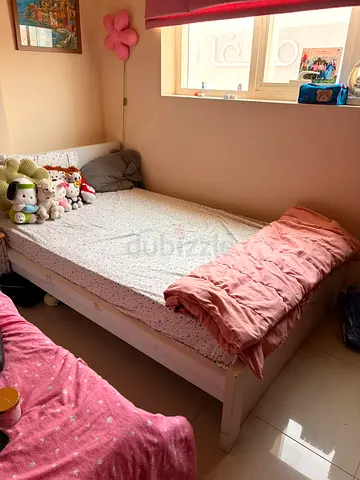 Single white wooden bed frame with mattress and side bed storage - good condition