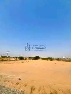 A corner plot of land on three streets, commercial, residential, at a special price