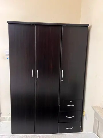 Dark wood 3-door wardrobe with 3 drawers - good condition