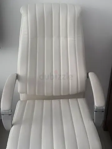 White ergonomic high-back office chair in good condition.