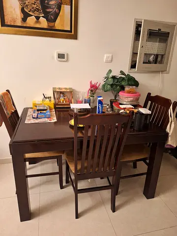 Dark wood 4-seater dining table with chairs - good condition