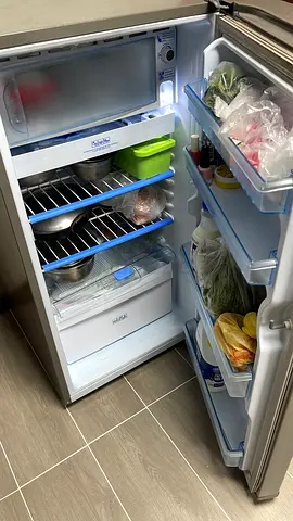 Used double-door refrigerator in good working condition