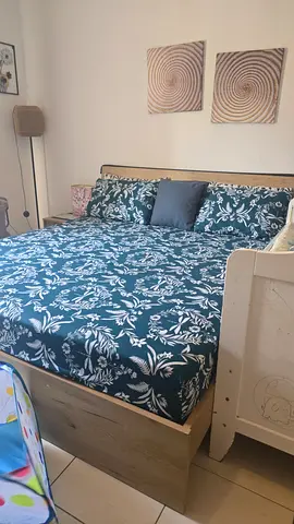 King-size wooden bed frame with 2 side tables and chest of drawers (good condition)