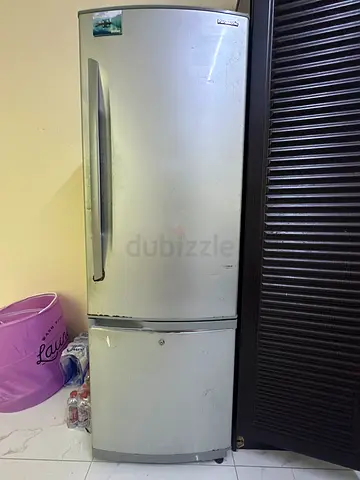Silver double-door refrigerator - used, working condition