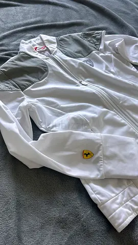 White Ferrari-branded zip-up jacket, lightly used