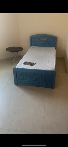 Single blue bed frame with mattress - good condition