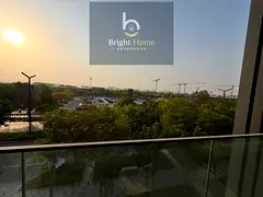 Close Kitchen | Front road view |Vida Residence Aljada | Fully equipped