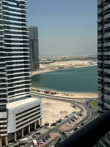 A distinctive one-bedroom apartment for rent in Al Taawun, featuring an excellent size and a beautiful open view. Located in a vibrant area close to a