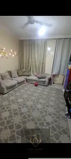 One-bedroom apartment with a living room in Al Rashidiya Towers, offering 1,160 sq. ft. of spacious