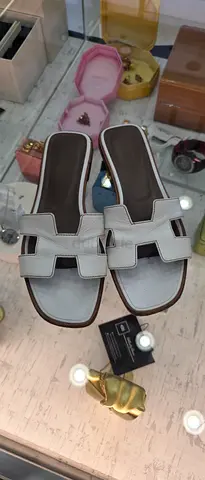 White slide sandals, gently used, size not marked