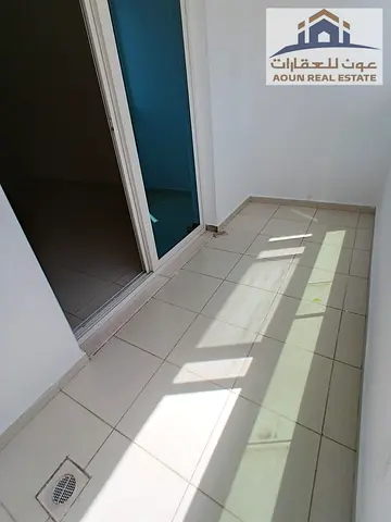 1-Bedroom Apartment for Annual Rent – Al Majaz 3 🏡 1 Bedroom + Living Room 🌅 Large Balcony 🛁 2 Bathrooms 🗄️ Built-in Wardrobes 🚗 Parking