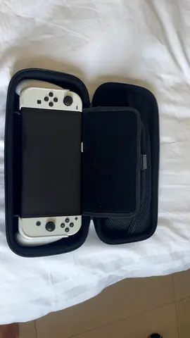 Nintendo Switch (white Joy-Con) with travel case - used, works well