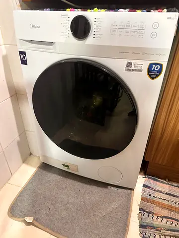 One year two months old Front load washing machine -working condition ( some sound while spin )