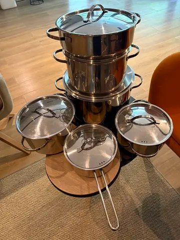 Stainless steel pot and pan set with lids - new.