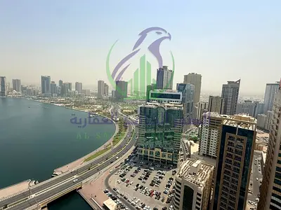 Two Master Bedrooms and Living Room in Al Majaz 3 with Free Parking Gym and Swimming Pool Balcony Store Room Hallway Direct Sea View Prime Location