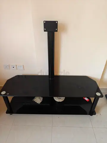 Black glass TV stand with center mount pole