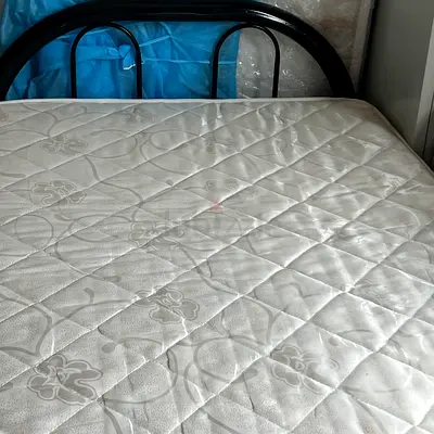 Single metal bed frame with mattress — good condition
