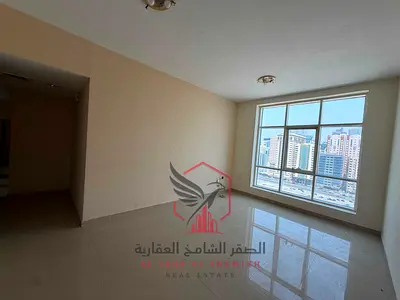 اطلالة بانورامية شهر مجانا 2 باركن مجاني اجمل غرفتين وصالة مع خزائن الحائط غرفة غسيل المخرج الاول الى دبي للايجار في التعاون